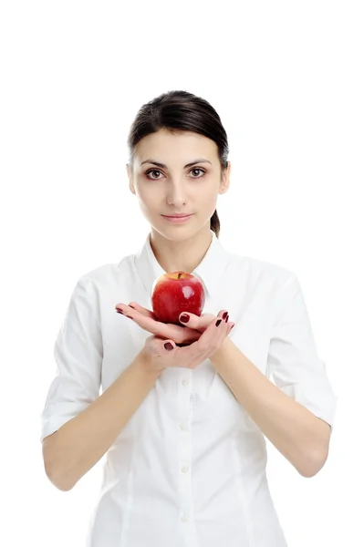 Flicka som håller rött äpple — Stockfoto