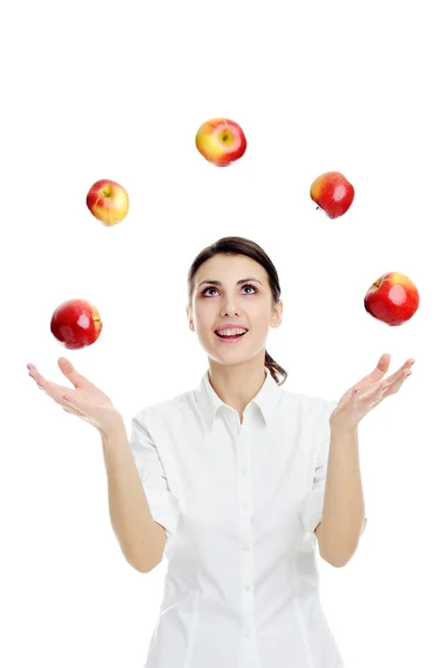 Игра с красными яблоками — стоковое фото