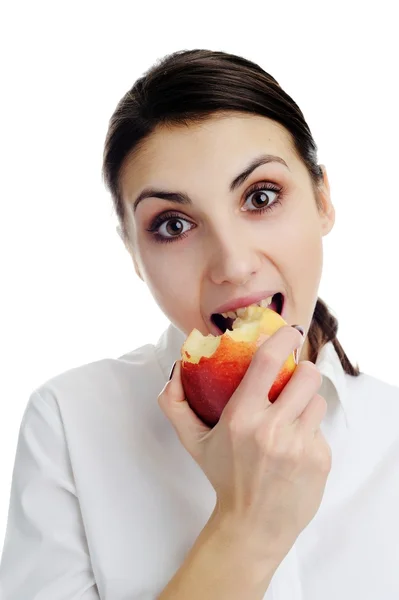 Piękna kobieta zje jabłko — Zdjęcie stockowe