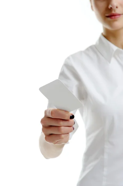 Woman holding blank businesscard in hand — Stock Photo, Image