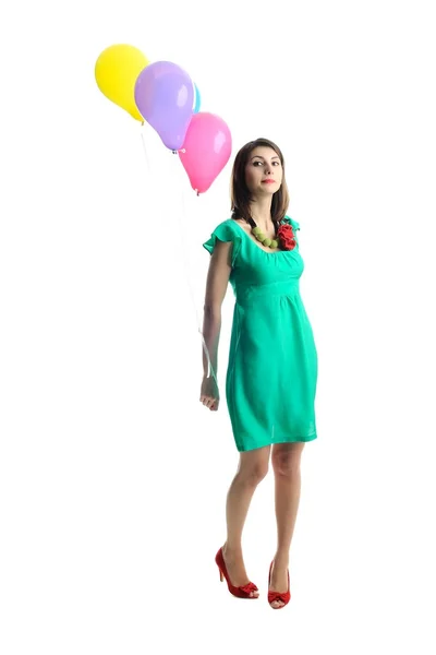 Молода жінка з повітряними кулями — стокове фото