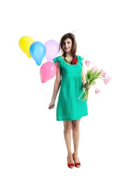 Κορίτσι με μπαλόνια και τουλίπες — Φωτογραφία Αρχείου