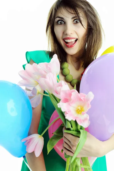 Menina com balões e tulipas — Fotografia de Stock