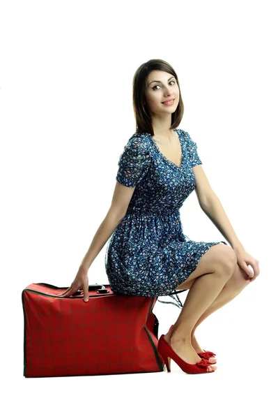 Милая женщина с красной сумкой — стоковое фото