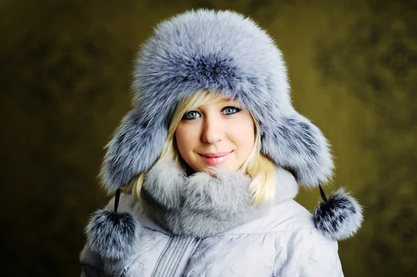 Girl in grey fur hat — Stock Photo, Image