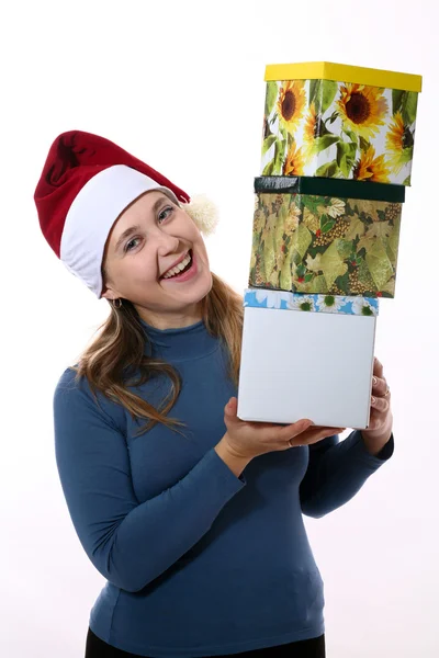 A gay girl in a cap with three boxes — Stock Photo, Image