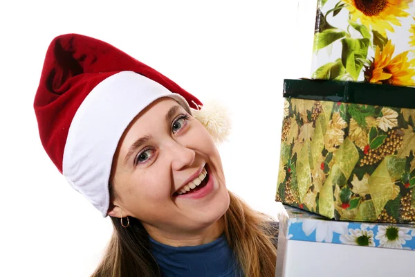 Una chica sonriente en una gorra con tres cajas —  Fotos de Stock