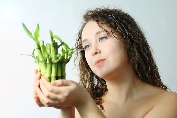 Woman with bamboo — Stock Photo, Image