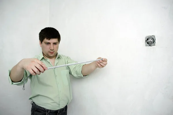 Taking measures with the tape — Stock Photo, Image