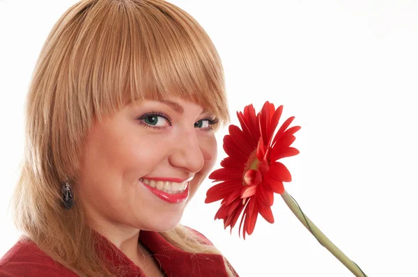 Girl in red with flowers — Stock Photo, Image