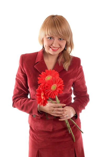 Usměvavá milá dívka s květinami — Stock fotografie