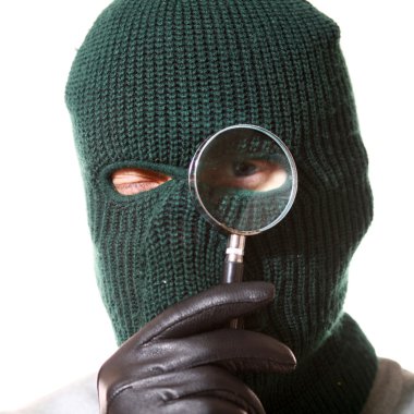 Thief with magnifier clipart