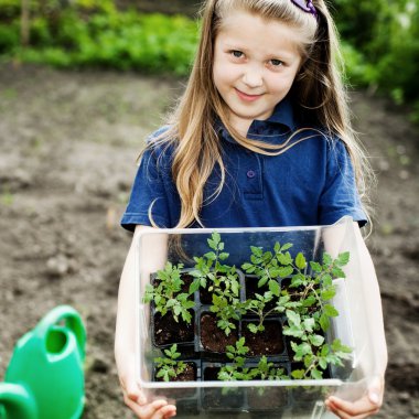 Girl with seedlings clipart