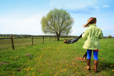 Girl in a field clipart