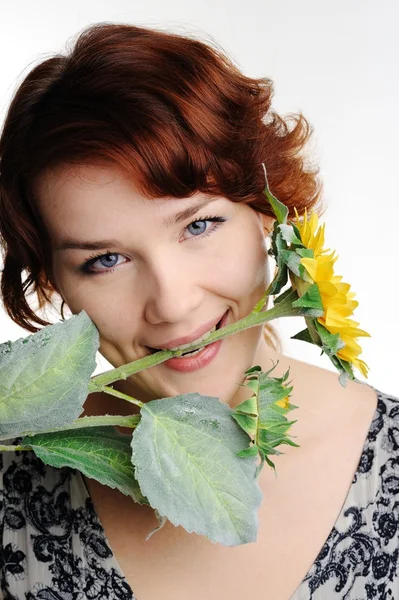 Žena s květinou — Stock fotografie
