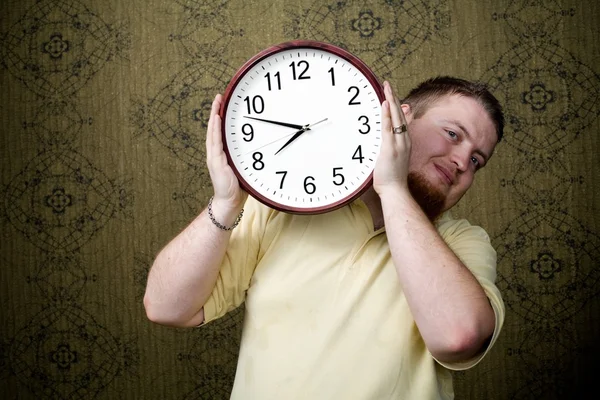 Man with a clock — Stock Photo, Image