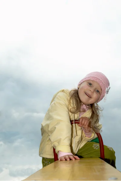 Girl in yellow jacket — Stock Photo, Image
