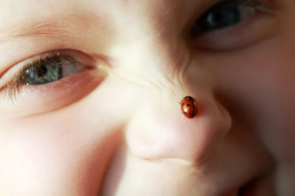Girl with ladybird — Stock Photo, Image