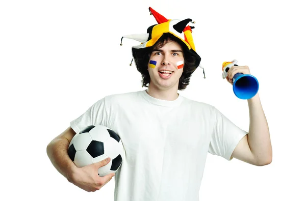 Футбольный болельщик с мячом и трубой — стоковое фото
