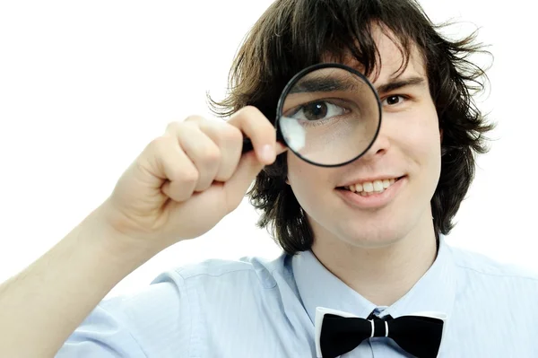 Man with a magnifier — Stock Photo, Image