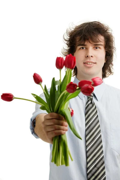 Человек с тюльпанами — стоковое фото