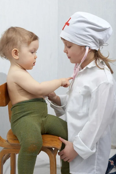 Girl and little baby — Stock Photo, Image