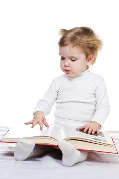 Baby med bok — Stockfoto