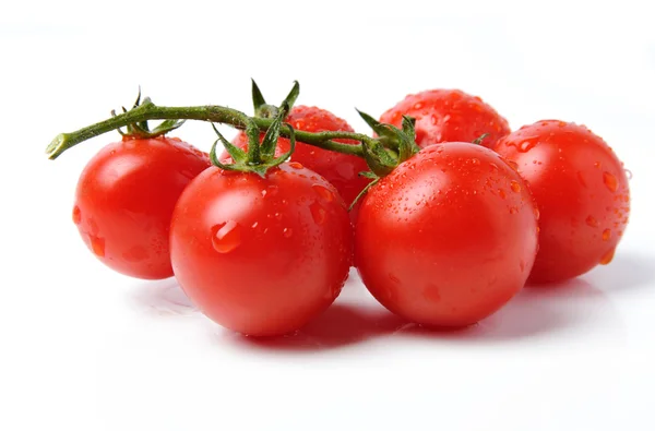 Red tomatoes with drops of water on them — Stock Photo, Image