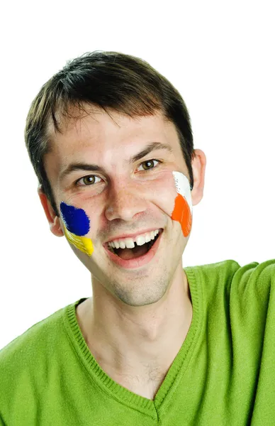 Tifoso di calcio con bandiere sul viso — Foto Stock