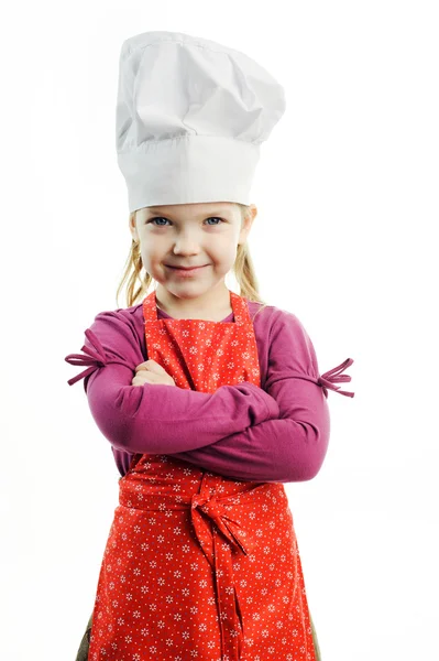 A nice girl in white hat and red apron — Stock Photo, Image