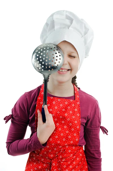 A girl with a colander in her hands — Stock Photo, Image
