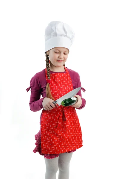 En liten flicka med zucchini — Stockfoto