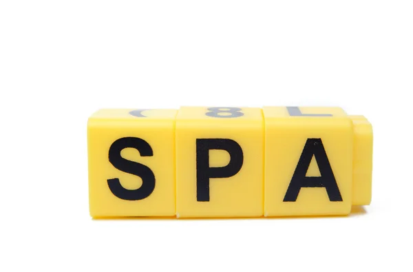 Yellow blocks with the word Spa on them — Zdjęcie stockowe