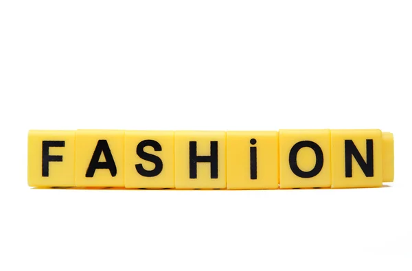 Yellow blocks with the word Fashion on them — Stock Photo, Image