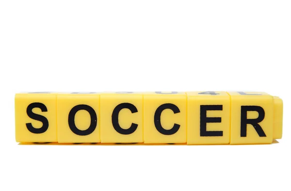 Bloques amarillos con la palabra Fútbol en ellos — Foto de Stock