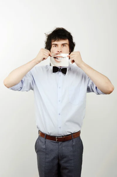 Un hombre con una foto en sus manos — Foto de Stock