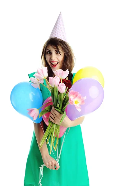 花と風船を持つ若い美しい女性 — ストック写真