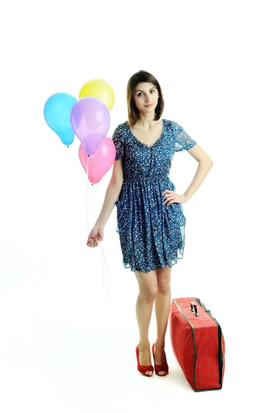 Mladá krásná žena s balónky a pytel — Stock fotografie