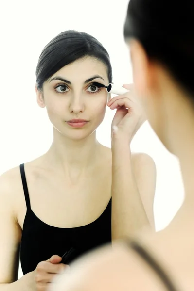 A young woman with mascara — Stock Photo, Image