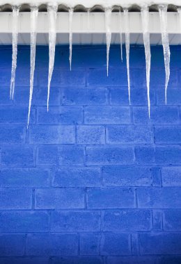 Icicles on a roof clipart