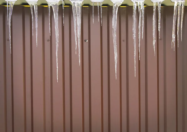 Icicles on a roof — Stock Photo, Image
