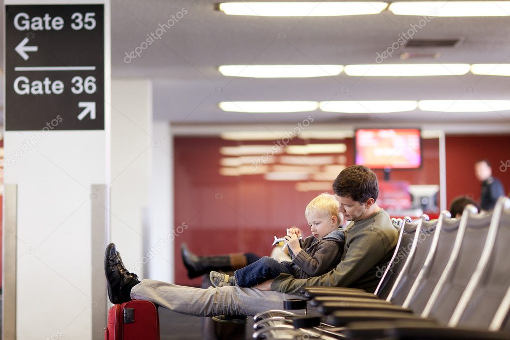Father and son at the airport