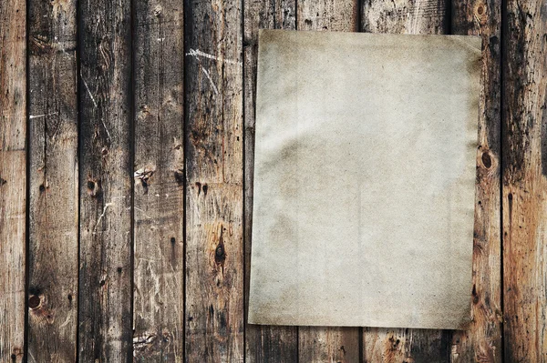 Paper on old wood texture Royalty Free Stock Images