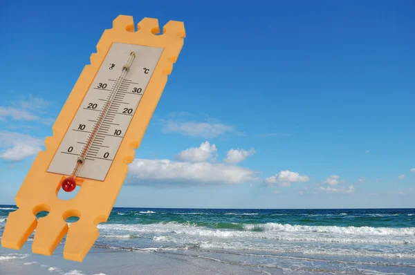 stock image Thermometer on blue sky background