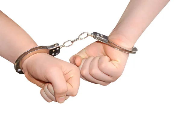Руки в наручники — стокове фото