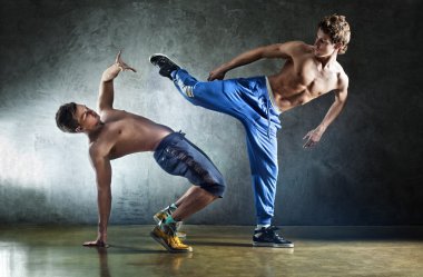 Two young men sports fighting clipart