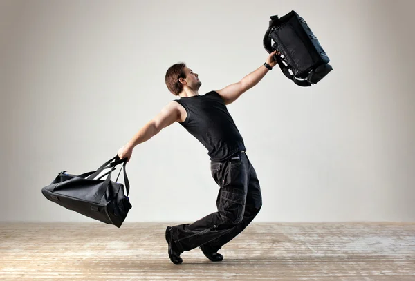 Dancing with bags — Stock Photo, Image