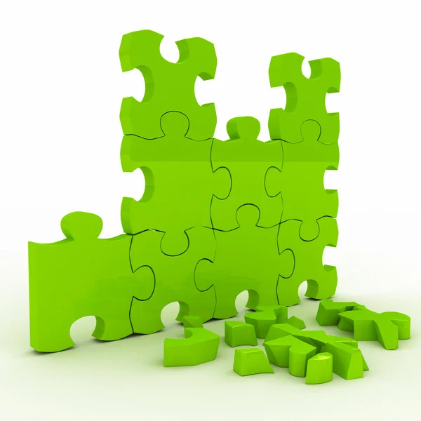Green brocken puzzle over white — Stock Photo, Image