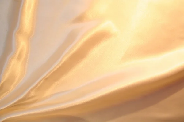 Gładki elegancki złoty jedwab tło — Zdjęcie stockowe