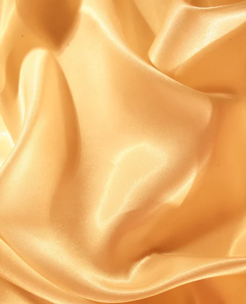 Seda dourada elegante suave como fundo — Fotografia de Stock